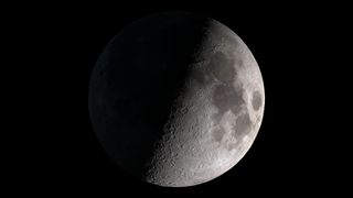 A photo of the moon in its First Quarter phase