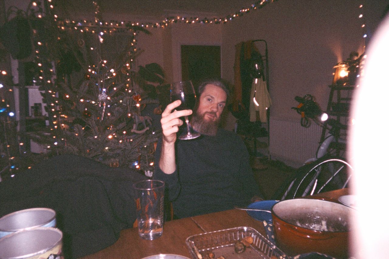 Grainy photo of house party during Christmas taken with the Flashback ONE35 redisposable digital camera
