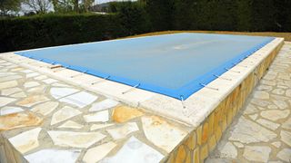 Swimming pool with cover for winter