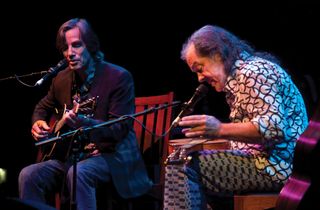 Jackson Browne and David Lindley perform on stage at Heineken Music Hall on June 9, 2010 in Amsterdam, Netherlands.