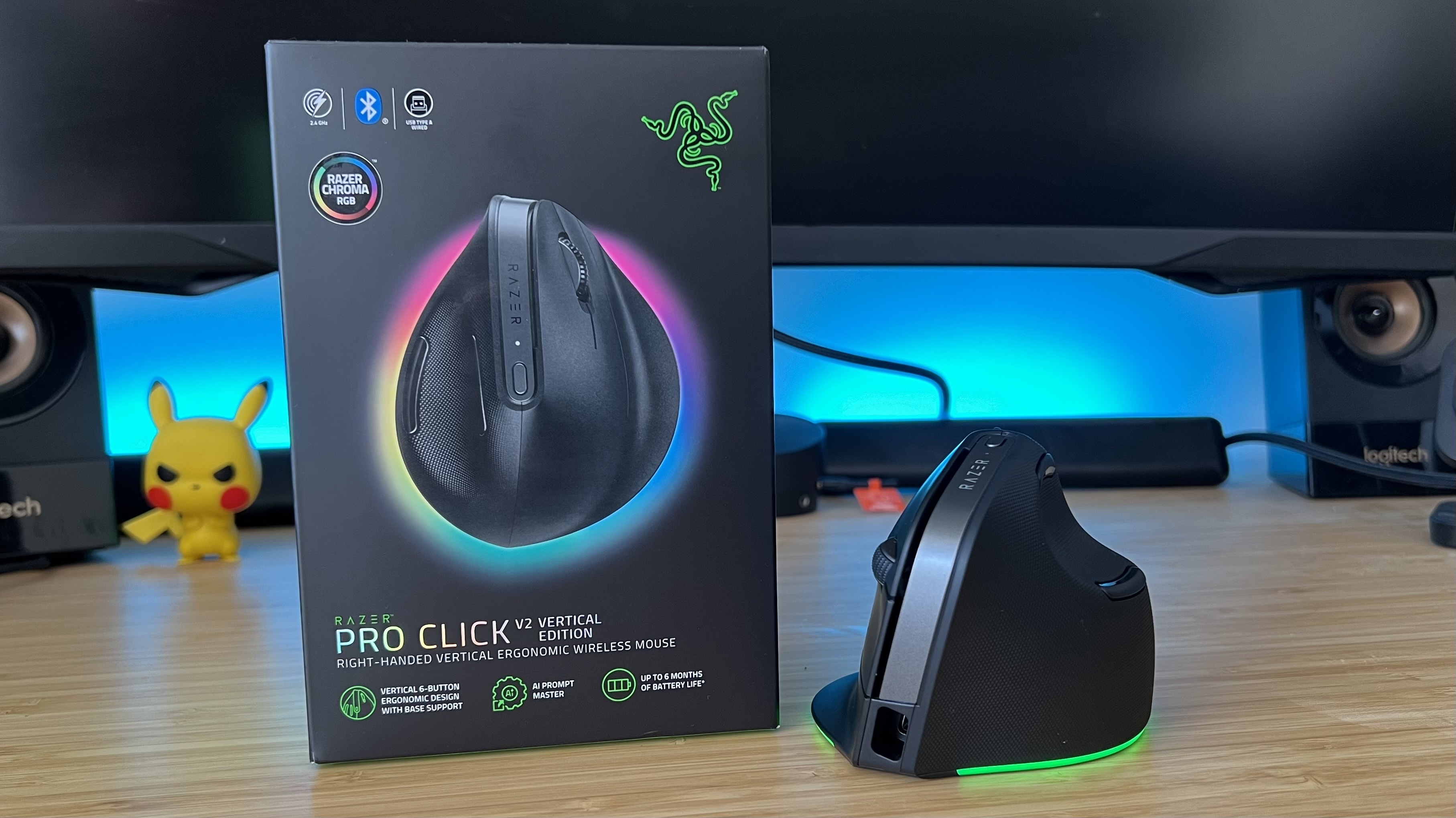 Razer Pro Click V2 Vertical Edition gaming mouse with packaging on a wooden desk