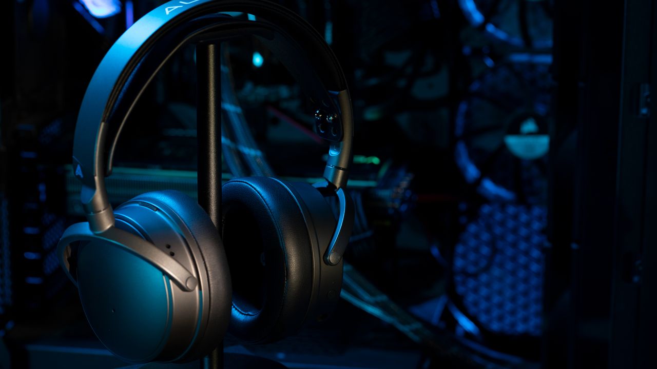 Audeze Maxwell wireless gaming headset for Xbox &amp; PC on a stand.