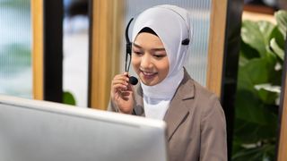 woman answering a voip phone call