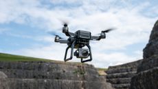 Bwine F7GB2 flying in a quarry on a sunny day