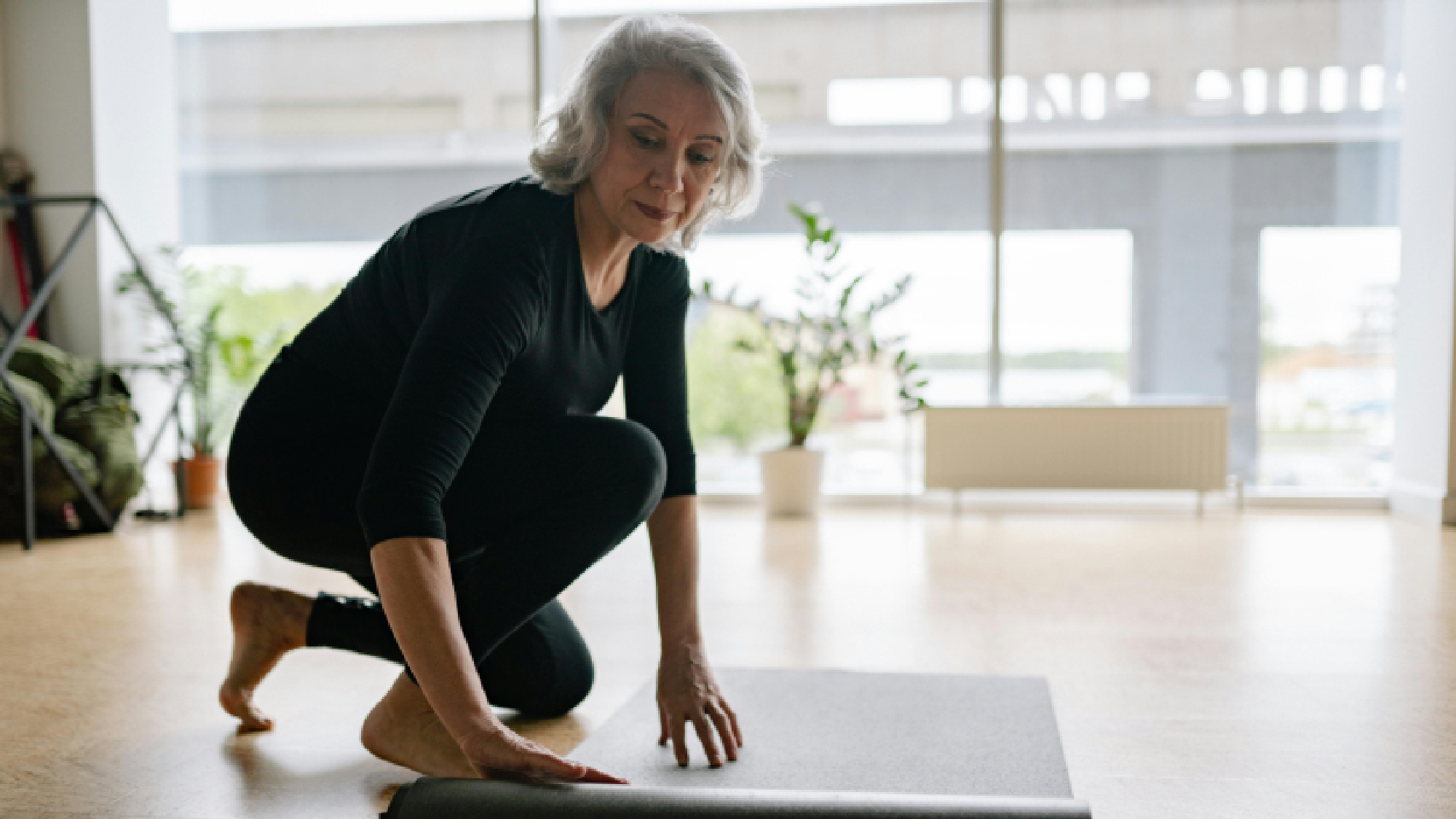 Woman and yoga mat