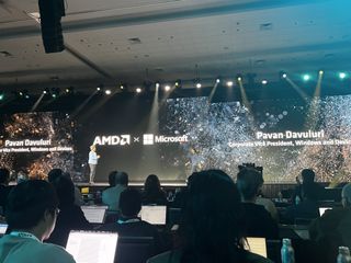 Pavan Davaluri, corporate VP for Windows and Devices at Microsoft on stage with AMD CEO Lisa Su at the AMD Advancing AI conference in San Francisco.