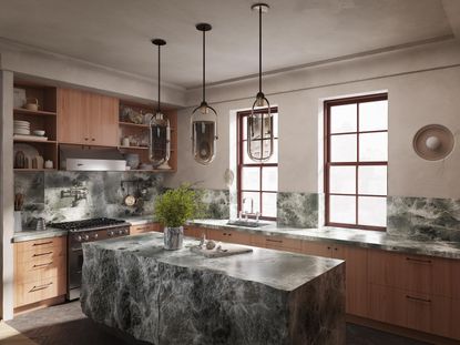 A warm wood kitchen with green grey marble accents.