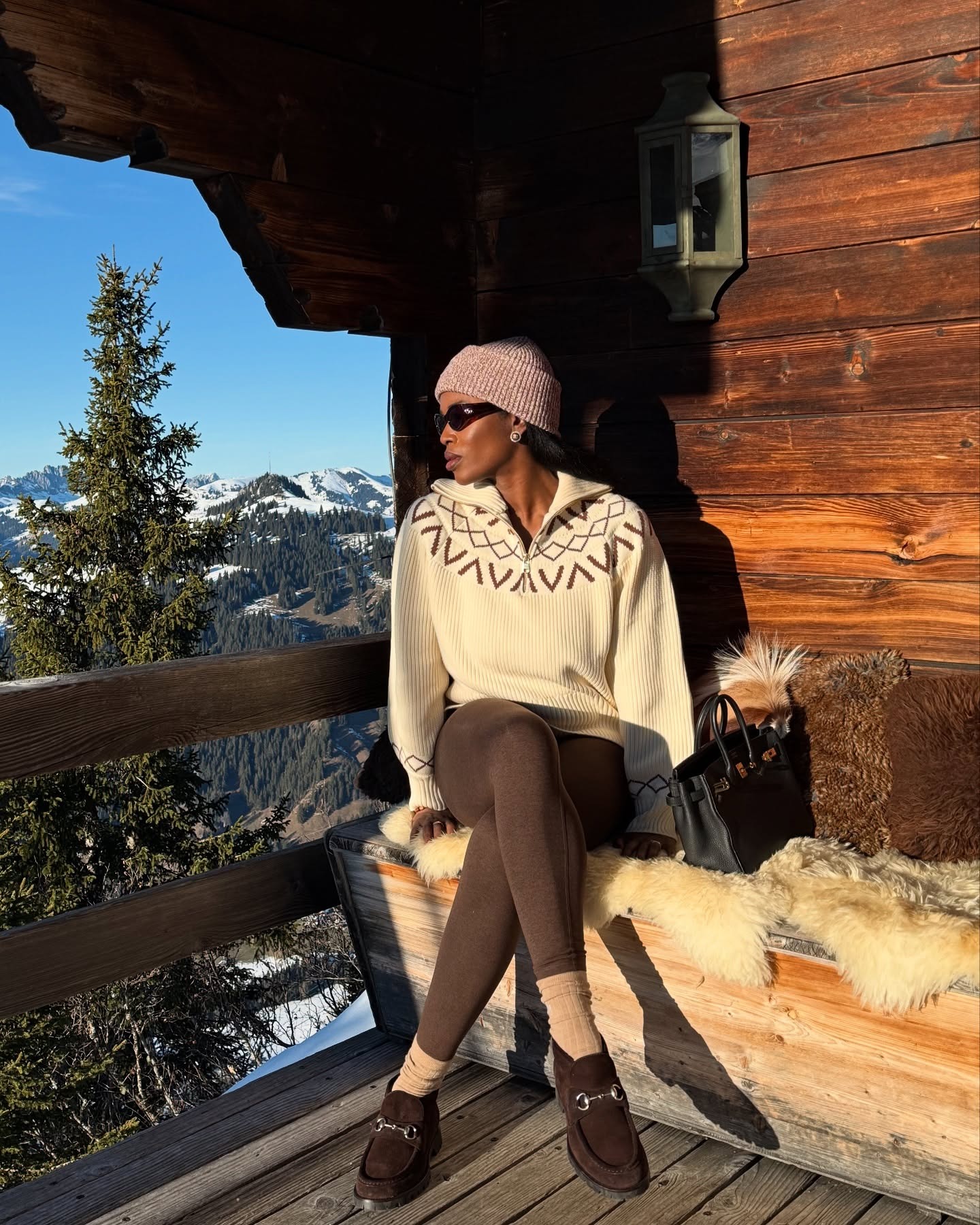 Influencer wearing winter travel outfit.