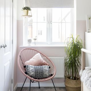 snug area with pink egg chair