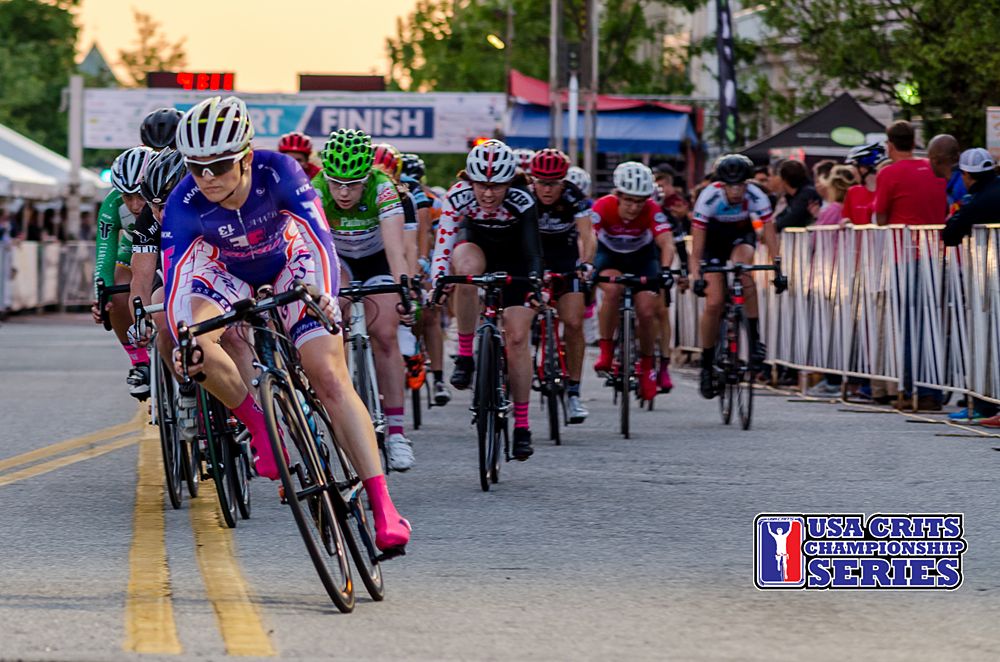 The peloton races through the corner