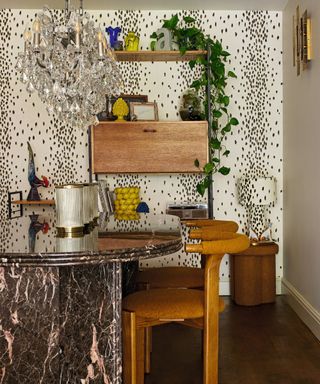 marble home bar with tall stools