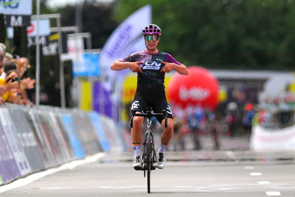 WAREGEM BELGIUM JUNE 20 Lotte Kopecky of Belgium stage winner celebrates at arrival during the 122th Belgian Road Championship 2021 Womens Road Race a 1224km one day race from Waregem to Waregem BELCycling belgiancycling on June 20 2021 in Waregem Belgium Photo by Luc ClaessenGetty Images
