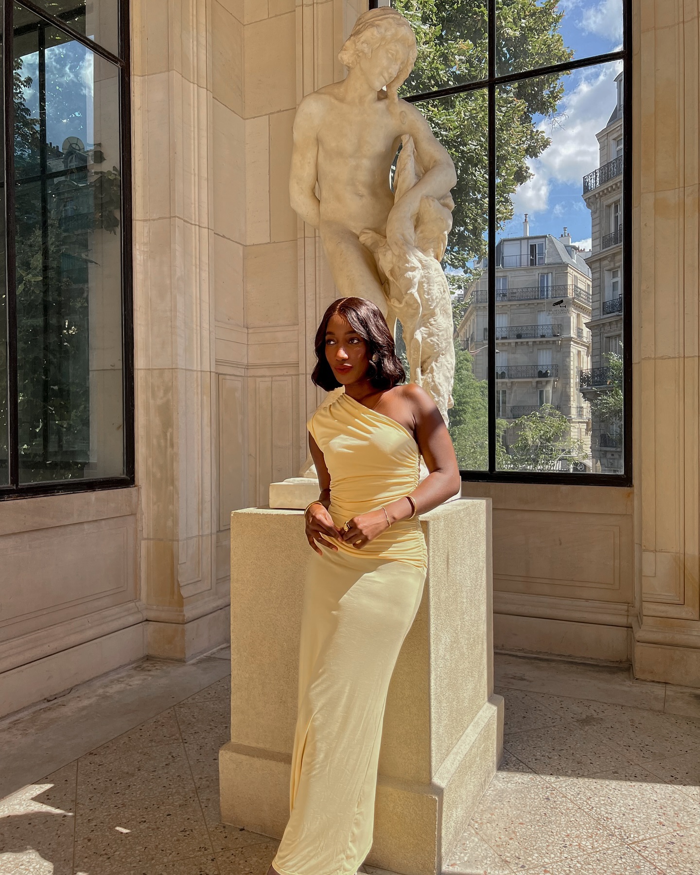 @aidabadji_ wears a yellow maxi dress