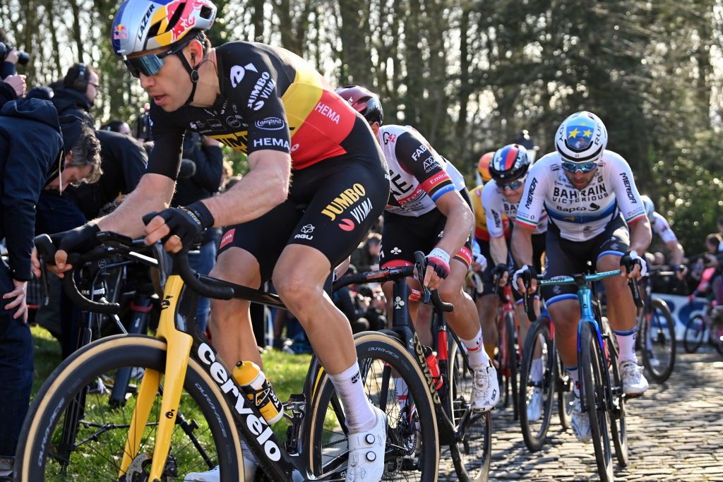 Belgian Wout Van Aert of Team JumboVisma Italian Sonny Colbrelli of Bahrain VictoriousItalian Matteo Trentin of UAE Team Emirates and Swiss Stefan Kung of GroupamaFDJ pictured in action on the Kapelmuur during the mens elite race of the Omloop Het Nieuwsblad oneday cycling race 2042km from Gent to Ninove Saturday 26 February 2022 BELGA PHOTO DAVID STOCKMAN Photo by DAVID STOCKMANBELGA MAGAFP via Getty Images