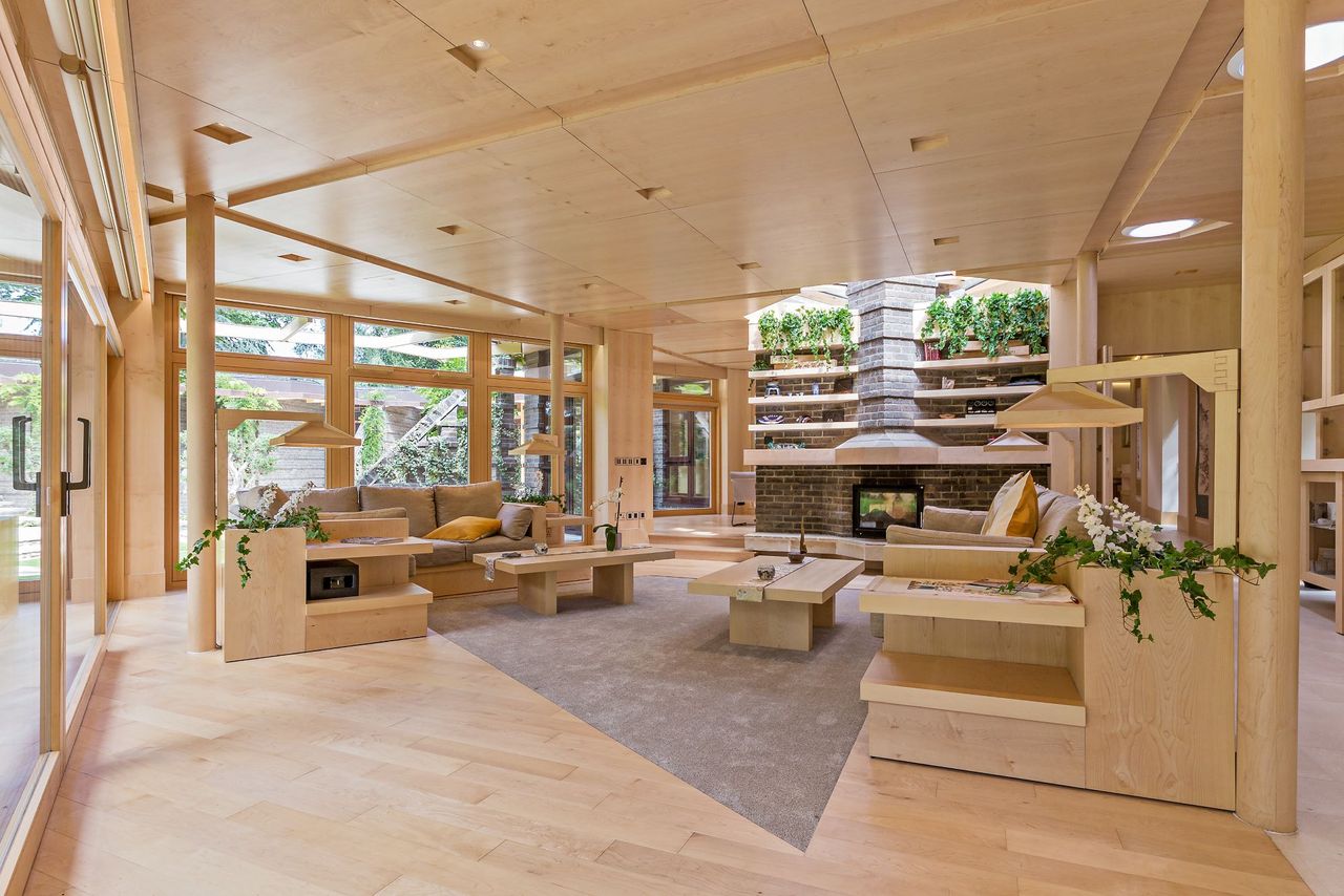 A view of the living roomo in the house with a neutral colour scheme