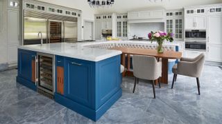 large open plan blue kitchen with island