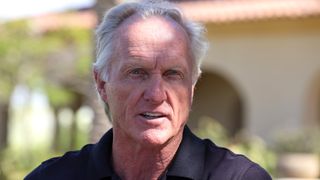 Greg Norman talks to the media in February 2022 at the Royal Greens Golf & Country Club