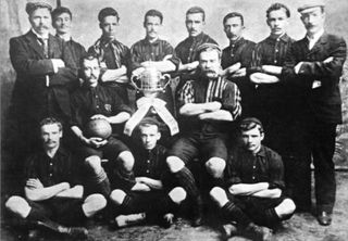 The CURCC team who won the inaugural Uruguayan Primera Division title in 1900, pictured with the trophy