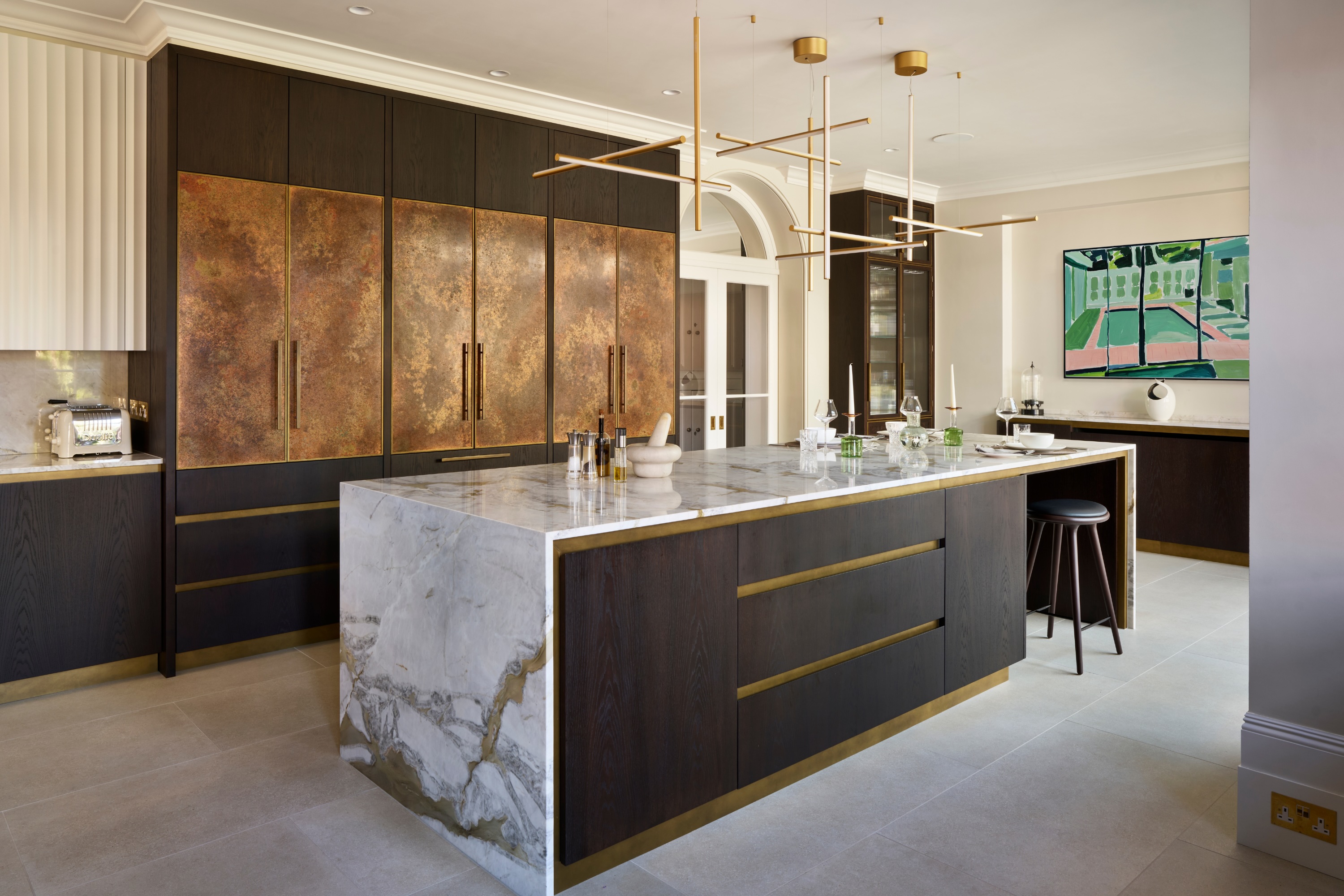 Modern kitchen with patinated copper cabinet door fronts