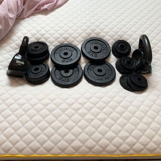 Weights on top of the Eve mattress for testing