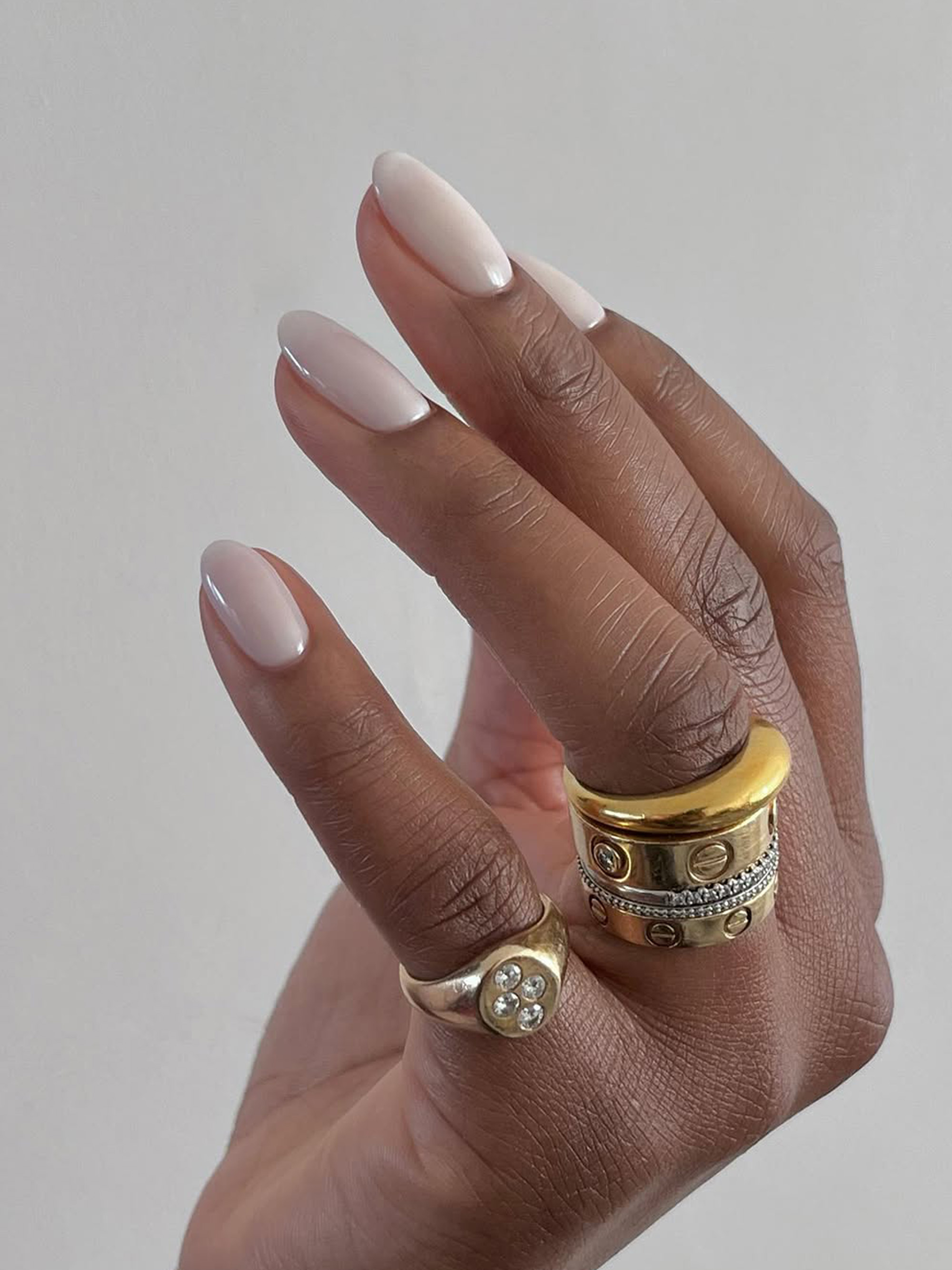 A milky white manicure by Julia Diogo