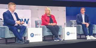 From left, Michael Newman and Stephanie Slagle of Graham Media Group and Joe Croney, Arc XP.