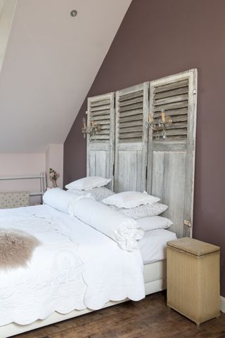 Dutch farmhouse renovation: bedroom with white bed and headboard pustjens Netherlands farmhouse renovation Joyce Vloet/Cocofeatures.com