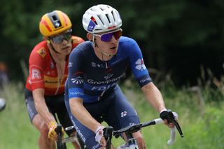 Team Uno-X's Danish rider Magnus Nielsen (L) and Team Groupama-FDJ's French rider Romain Gregoire ride in a breakaway during the sixth stage of the 76th edition of the Criterium du Dauphine cycling race, 174,1km between Hauterives and Le Collet d'Allevard, French Alps, on June 7, 2024. (Photo by Thomas SAMSON / AFP)