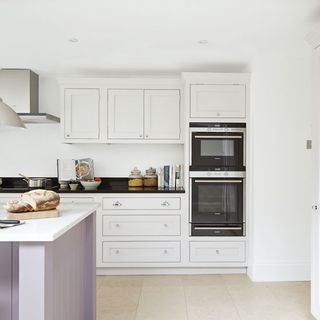 kitchen with oven and kitchen cabinet