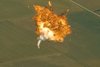 A SpaceX Falcon 9 Reusable rocket explodes during test flight on Aug. 22, 2014.