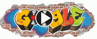 Google logo as graffiti letters on a brick wall