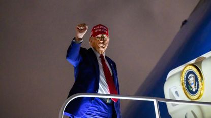President Donald Trump boards plane in Florida