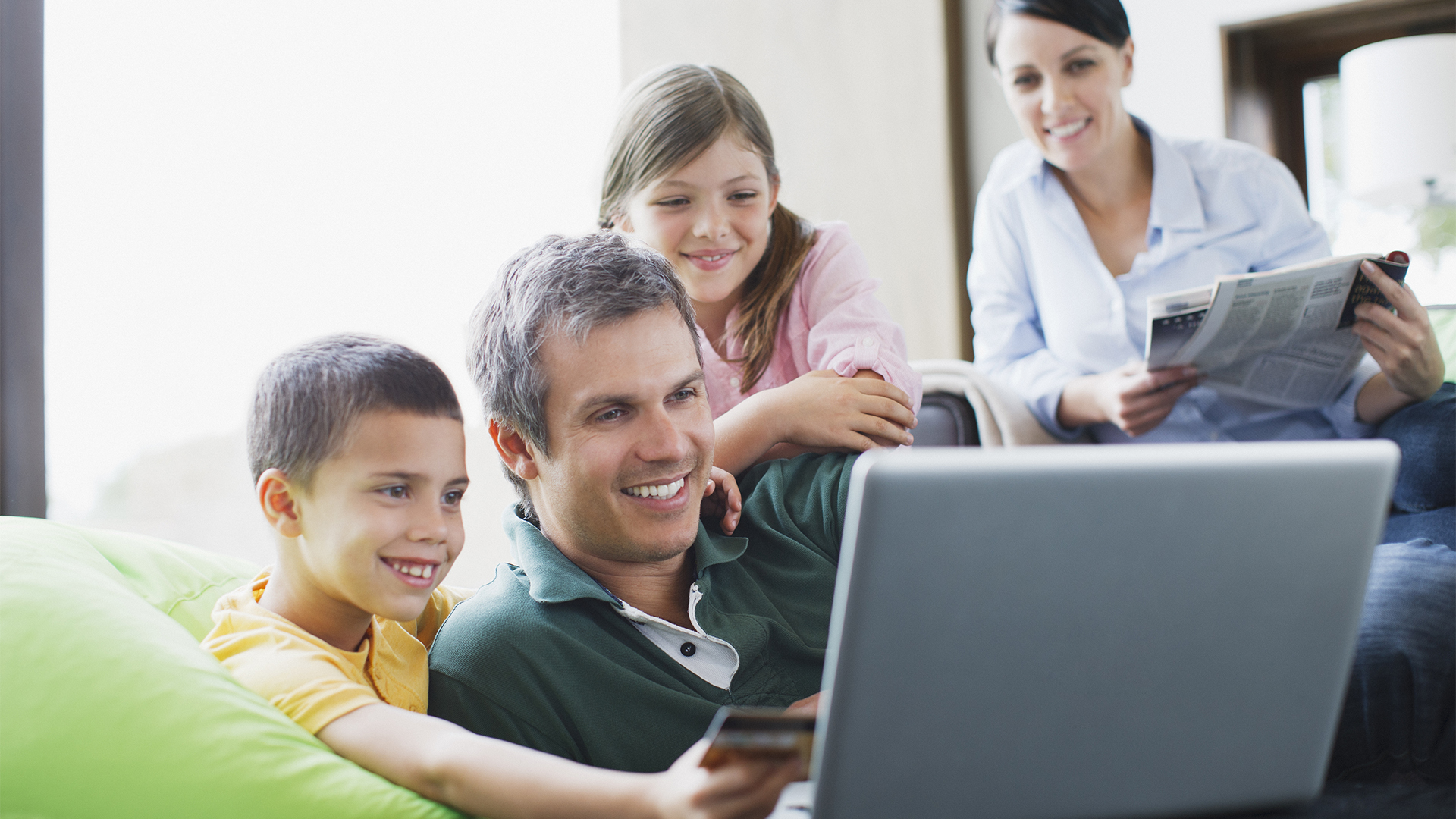 A happy family playing an online game