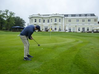 Neil Tappin putting from off the green at Burhill Golf Club