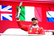 Lewis Hamilton of Great Britain and Scuderia Ferrari on the podium with his trophy during the F1 Grand Prix of Canada