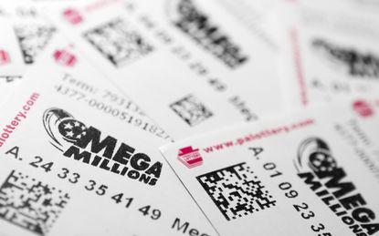 Philadelphia, United States - March 13, 2011: Many Mega Millions lottery tickets. Mega Millions is Americas biggest jackpot game. It is held in 42 states and has jackpots starting at $12 mill