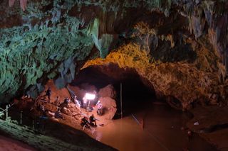 Rescuers inside the Tham Luang Nang Non cave, where 12 boys and their coach became trapped in the summer of 2018