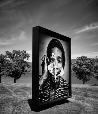 black and white portraits on grass