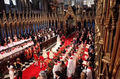 The royal family sits on the right side of the church during the ceremony. 