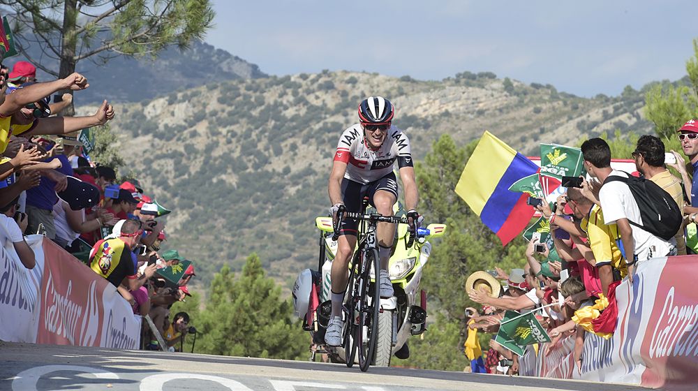 Iam's Swiss cyclist Mathias Frank crosses the finish line to win the 17th stage of the 71st edition of 'La Vuelta'