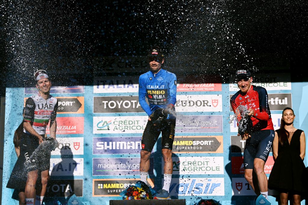 SAN BENEDETTO DEL TRONTO ITALY MARCH 12 LR Joao Almeida of Portugal and UAE Team Emirates on second place race winner Primoz Roglic of Slovenia and Team Jumbo Visma Blue Leader Jersey and Tao Geoghegan Hart of The United Kingdom and Team INEOS Grenadiers on third place pose on the podium ceremony after the 58th TirrenoAdriatico 2023 Stage 7 a 154km stage from San Benedetto del Tronto to San Benedetto del Tronto UCIWT TirrenoAdriatico on March 12 2023 in San Benedetto del Tronto Italy Photo by Tim de WaeleGetty Images
