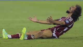 Akram Afif celebrating Qatar's 2026 World Cup qualification