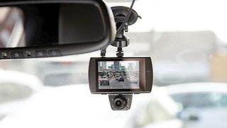 Car & Driver Road Patrol Touch Duo dash cam installed in car