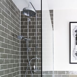 bathroom with grey brick wall and shower