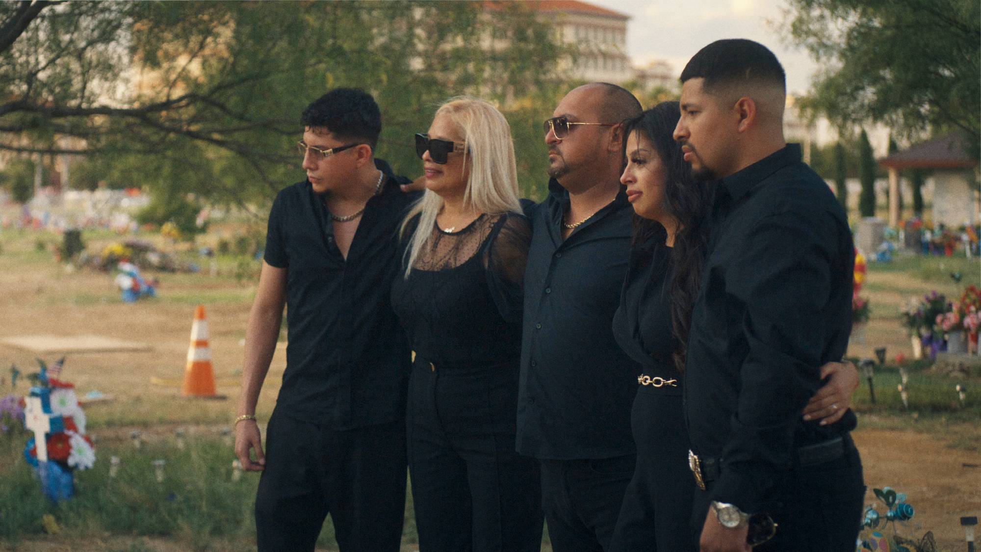 An image of a grieving family from "Trainwreck: The Astroworld Tragedy" on Netflix