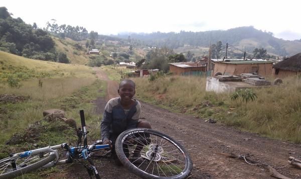 My new South African friend who was eager to drop the firewood he was dragging and help me change my flat tire.