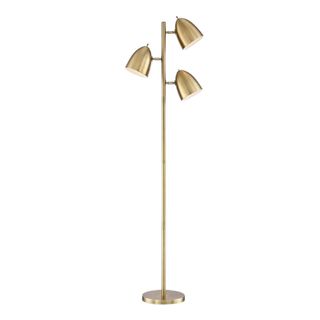 A gold floor lamp with three lampshades
