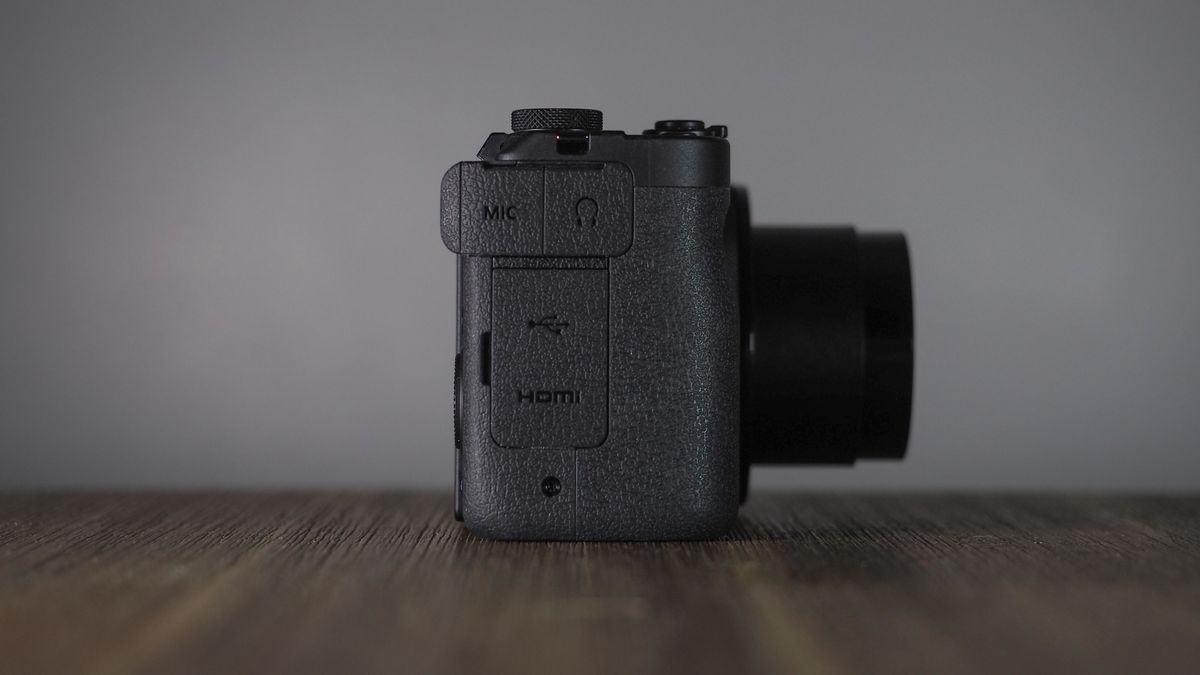Canon PowerShot V1 on a wooden surface