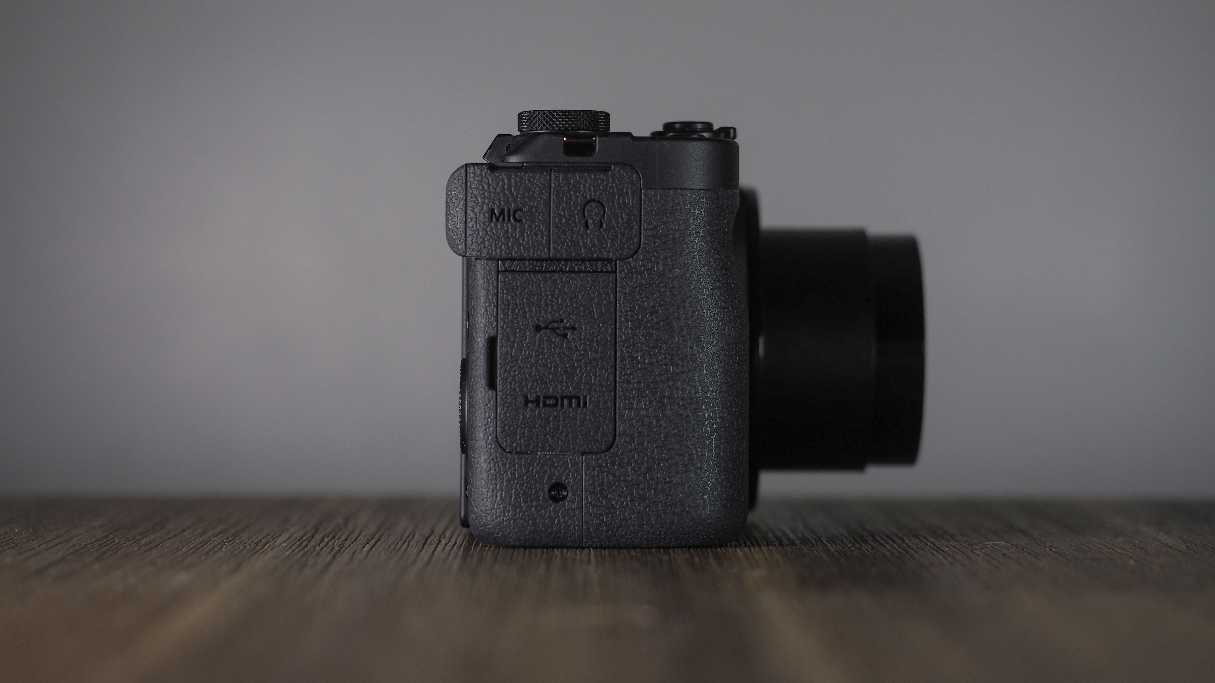 Canon PowerShot V1 on a wooden surface