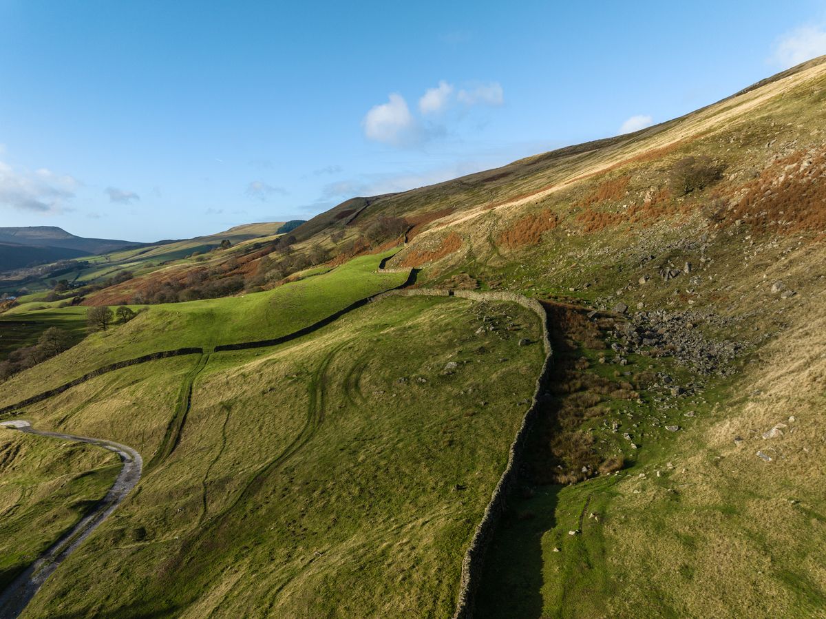Image taken by James Abbott using the DJI Mavic 3 Classic. Here we see an overhead shot of a grassy hillside.